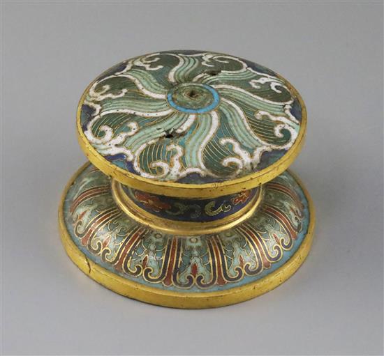 A Chinese gilt bronze and cloisonne enamel stand, late Ming dynasty, Diam.10cm, with holes in the top for a Buddhist emblem?